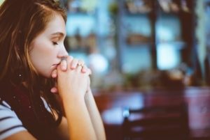 woman sitting alone